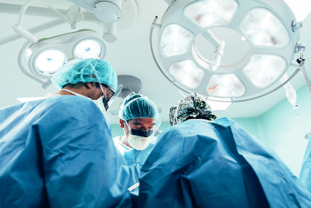 Surgeon team during a procedure in an operating room.