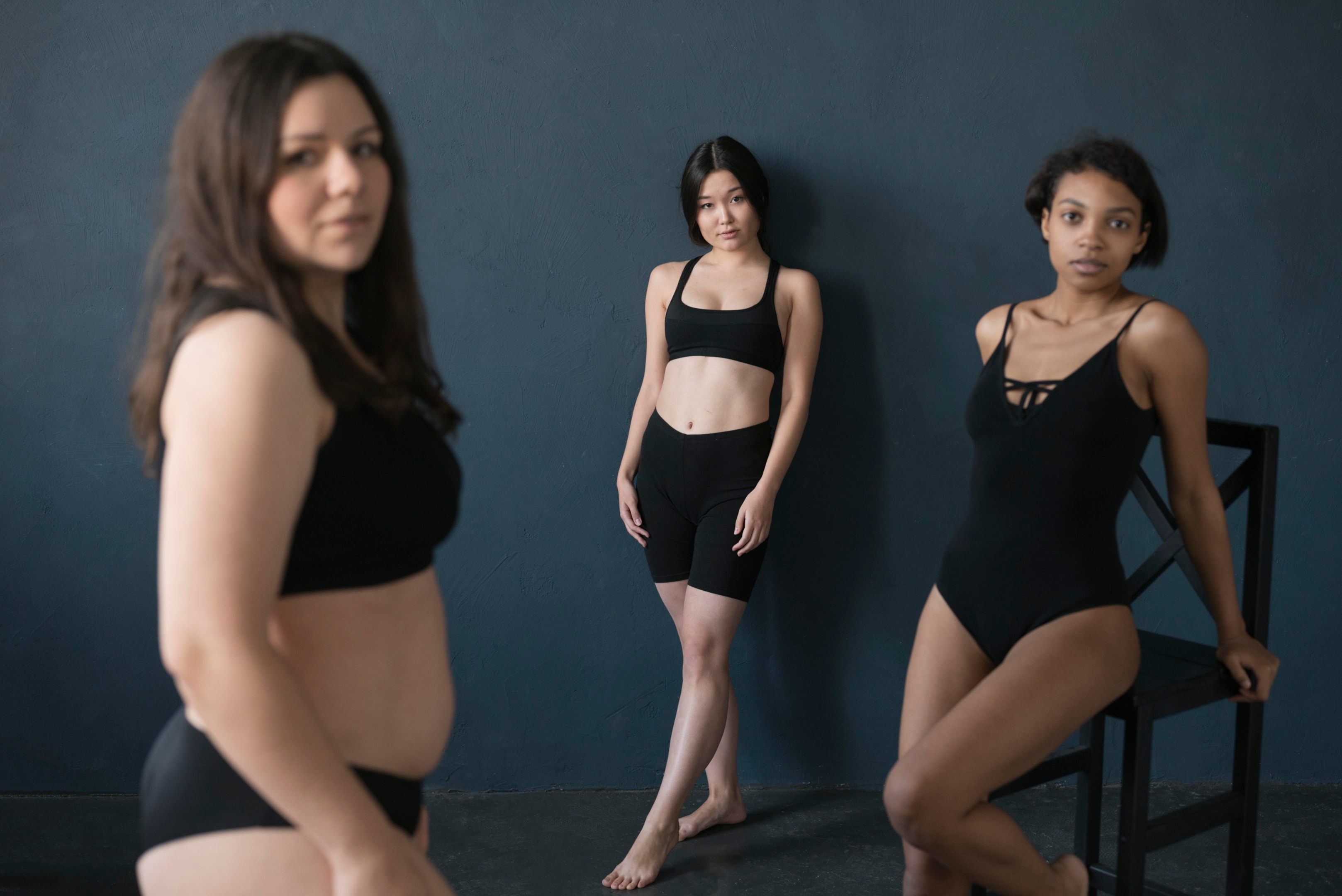 Three Women wearing black underware.